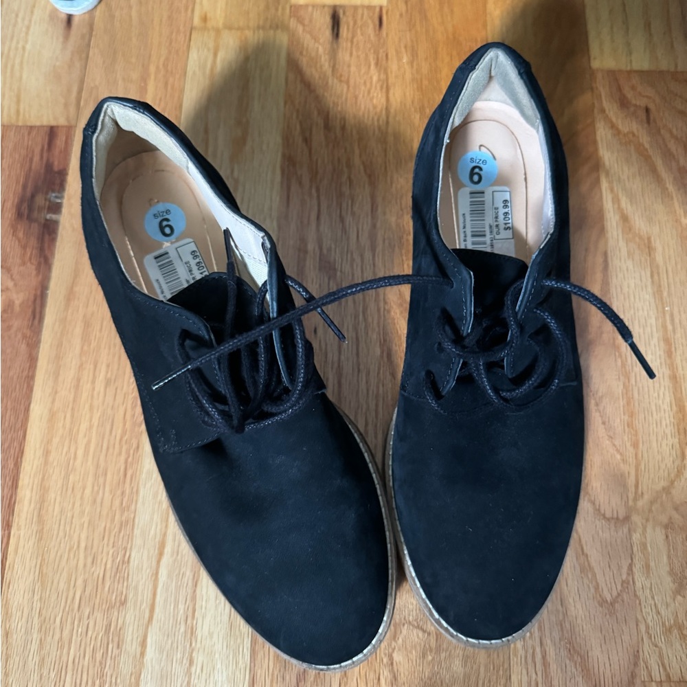 Brand New Clarks Newley Bloom booties. Size 6 black suede. Brand new without box